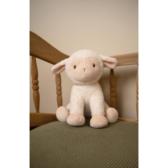 mouton en peluche avec laisse